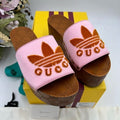 Women’s Gucci, X Adidas, pink satin GG clogs size 37 made in Italy.