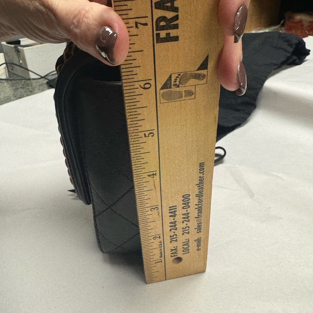 Chanel Black and Tan flap bag with gold hardware/adjustable strap/back pocket