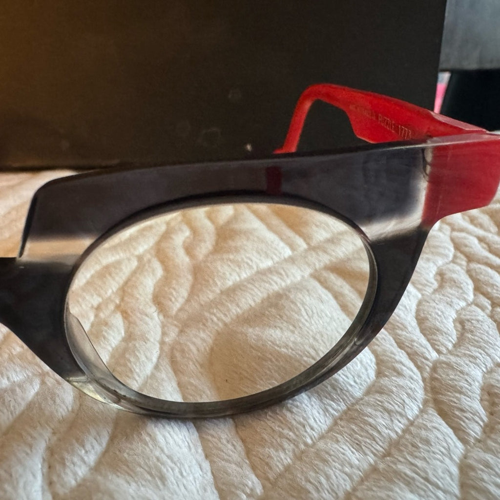 Anne & Valentin custom frames hand crafted in France 
Eyeglass Art Red Black