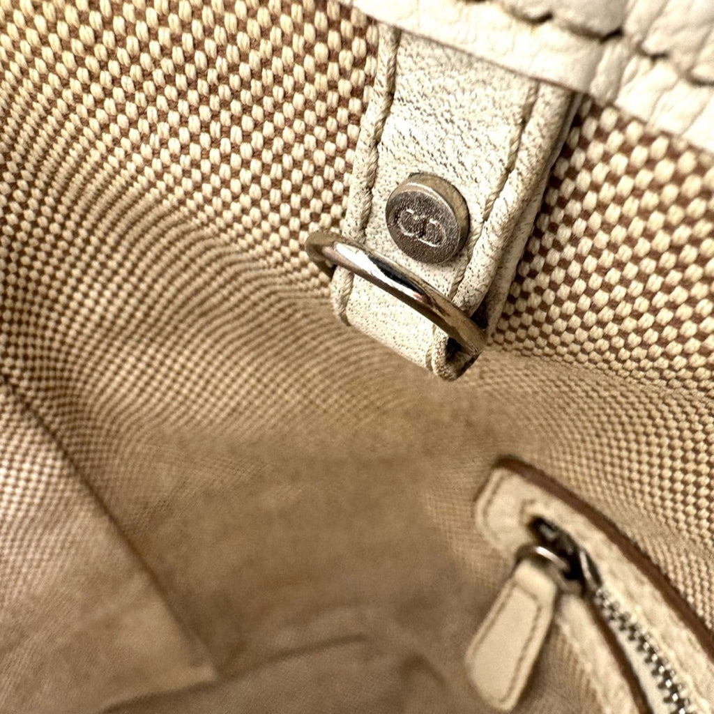 Dior canvas Canage shoulder tote with knotted leather straps/silver hardware