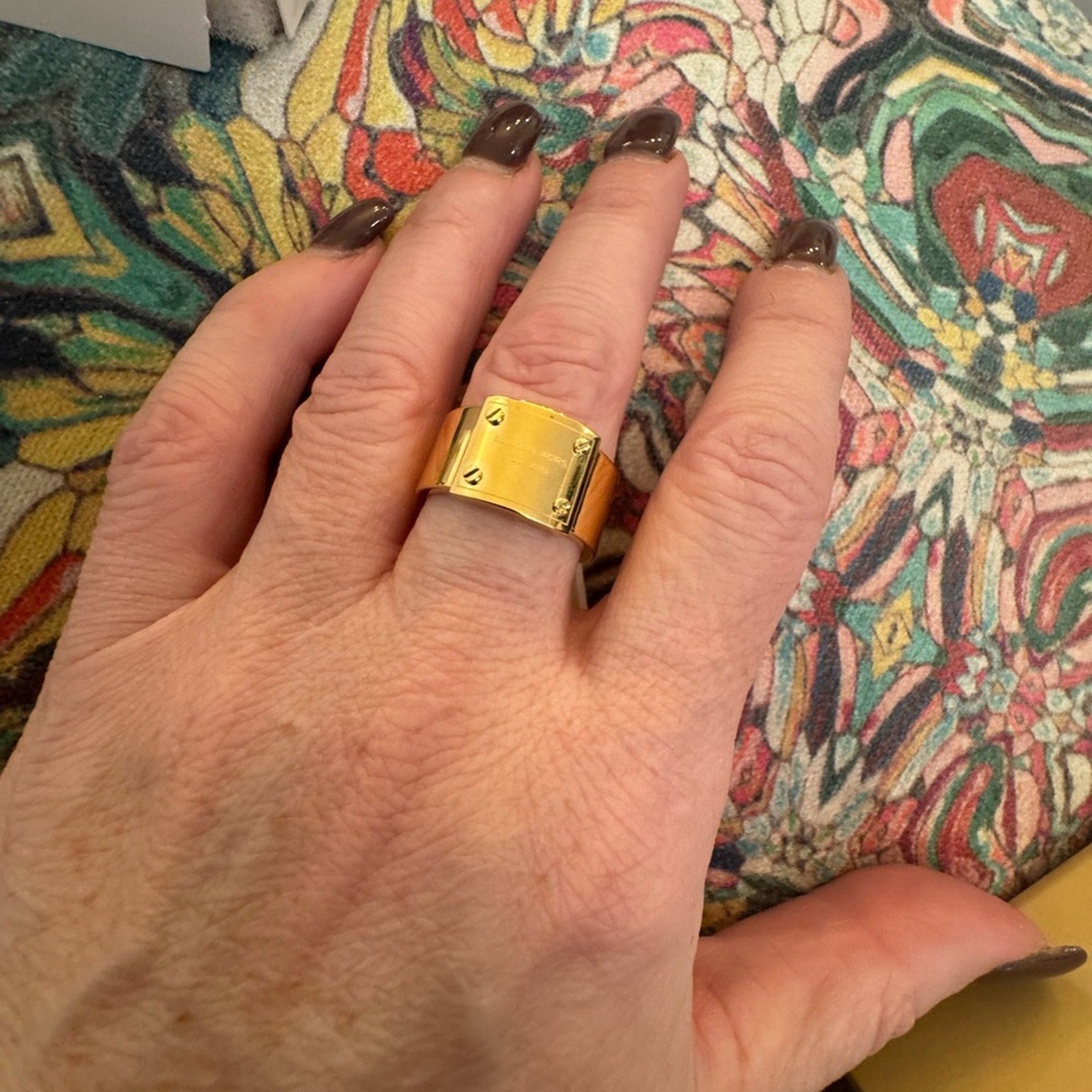 Michael Kors Gold Plated ring NIB  logo plaque riveted onto smaller band size 8