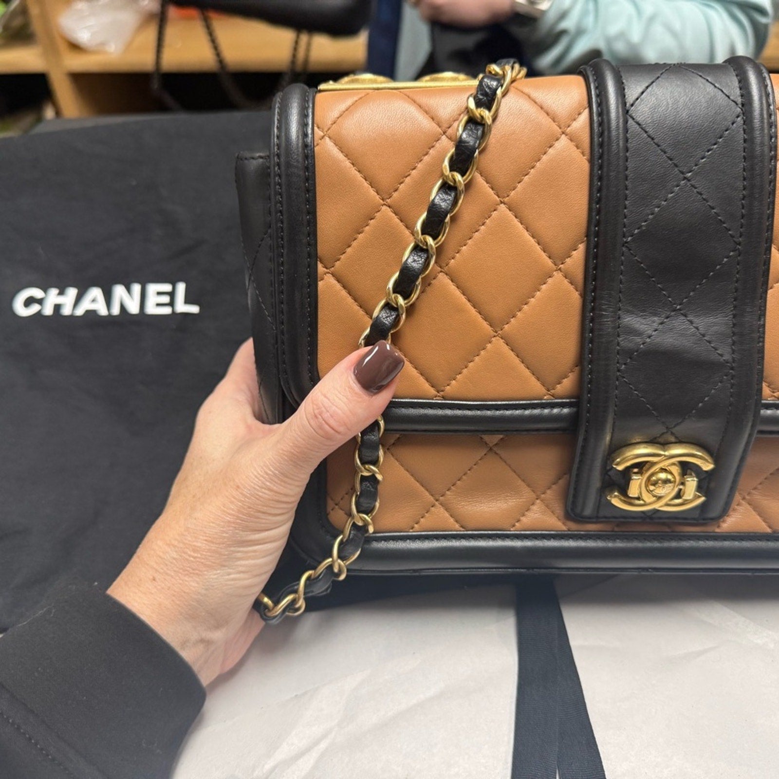 Chanel Black and Tan flap bag with gold hardware/adjustable strap/back pocket