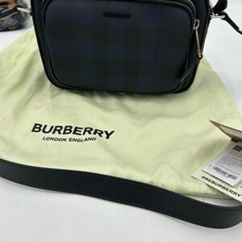 Men's Burberry, check messenger bag in navy blue. Adjustable shoulder strap.