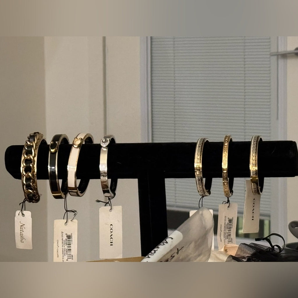 6 Coach NWT’s(each $98)& a bonus Chanel style cuff also NWT’s bundle price $399