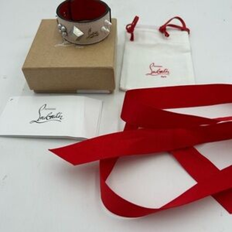 Christian Louboutin Paloma spike embellished leather bracelet. NWT.