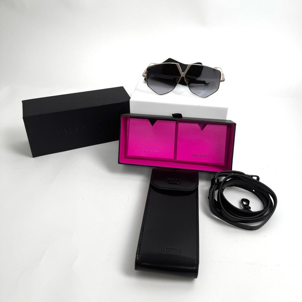 VALENTINO GARAVANI
V-Hexagon Titanium Sunglasses
Branded/crossbody bag included