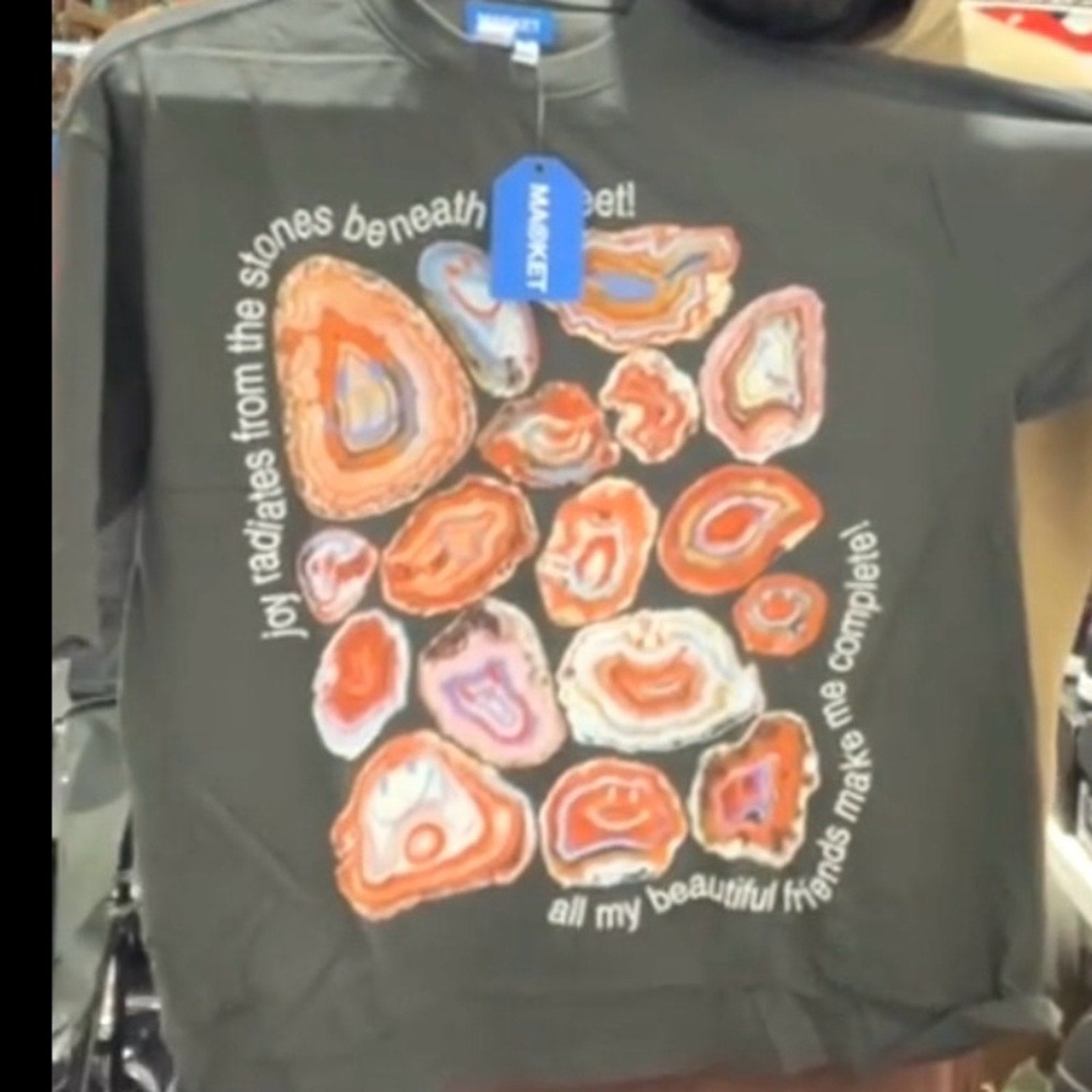 Market smiley, radiating joy, T-shirt, size large new in the bag