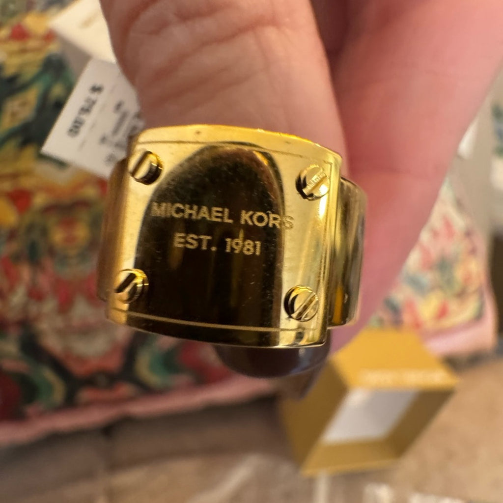 Michael Kors Gold Plated ring NIB  logo plaque riveted onto smaller band size 8