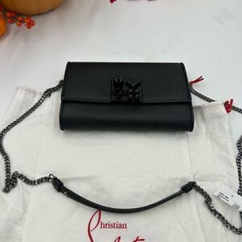 Christian Louboutin,Carasky leather clutch/shoulder bag made in Italy
