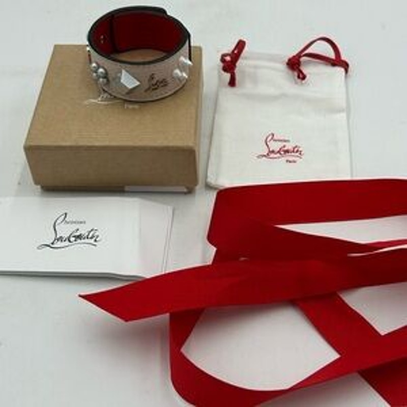 Christian Louboutin Paloma spike embellished leather bracelet. NWT.