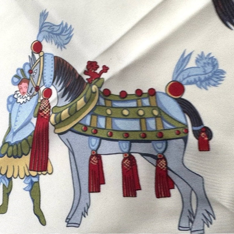 Hermes silk scarf red/blue colorway/whimsical sleds horses w/flourishes of color