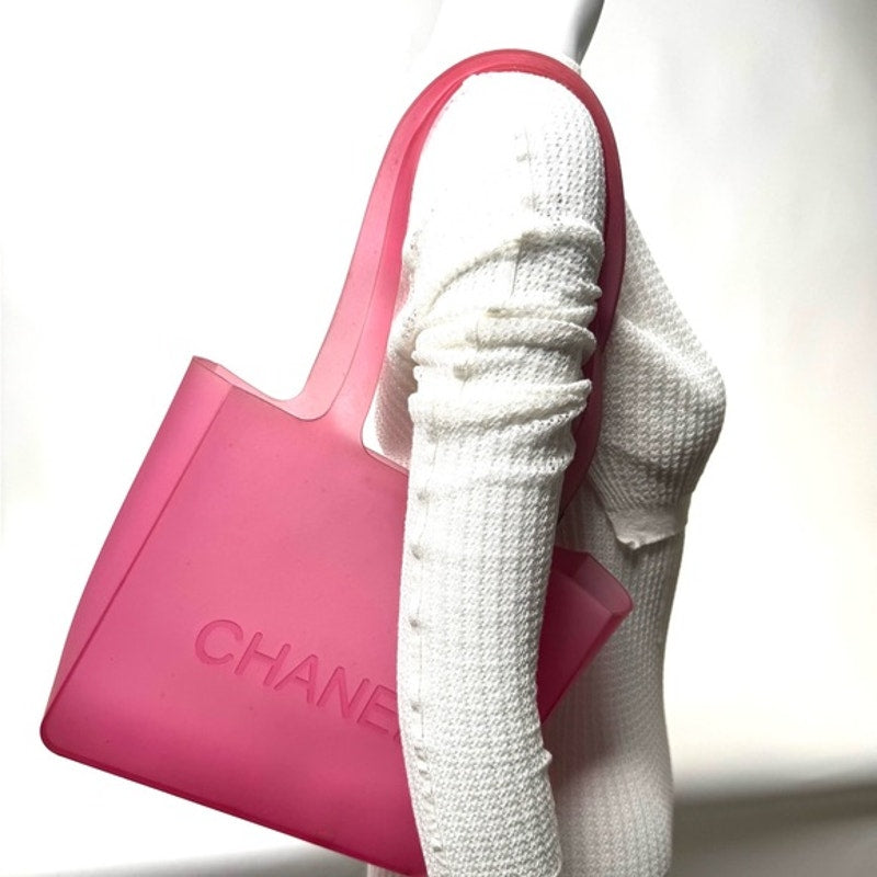 Chanel Pink Tote w/ Silver detail on strap in a neoprene, rubber like material