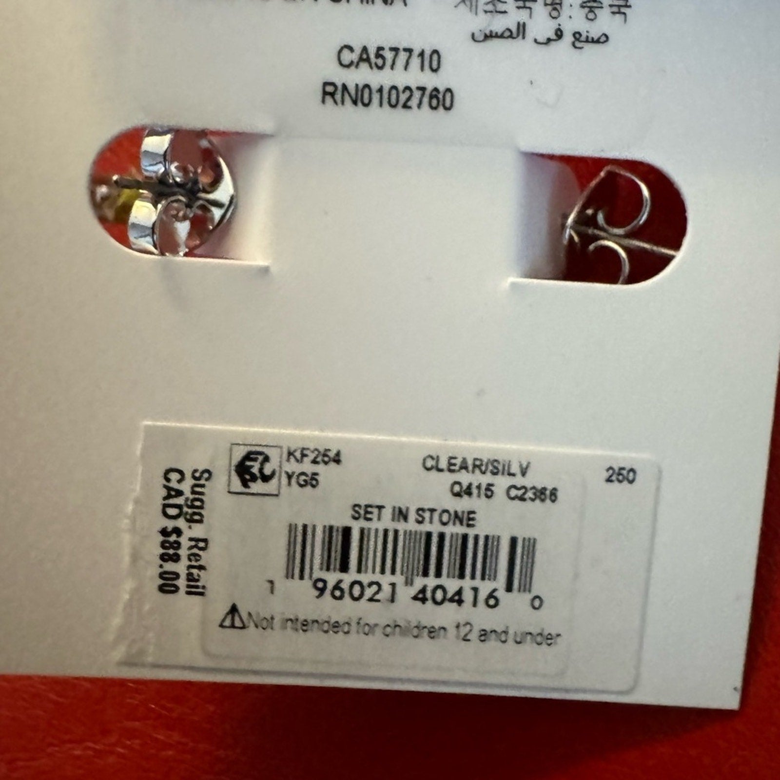 Kate Spade NWT’s silver toned post hoops with rhinestone star detail