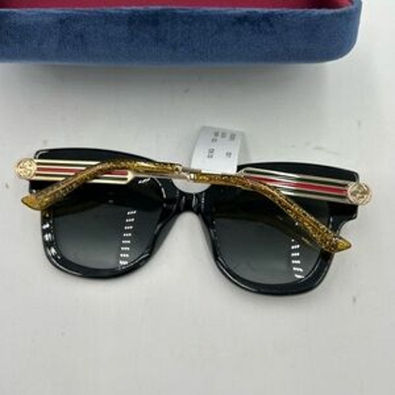 Gucci GG0281S – 001 black acetate frame sunglasses with gray lenses NWT