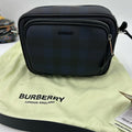 Men's Burberry, check messenger bag in navy blue. Adjustable shoulder strap.