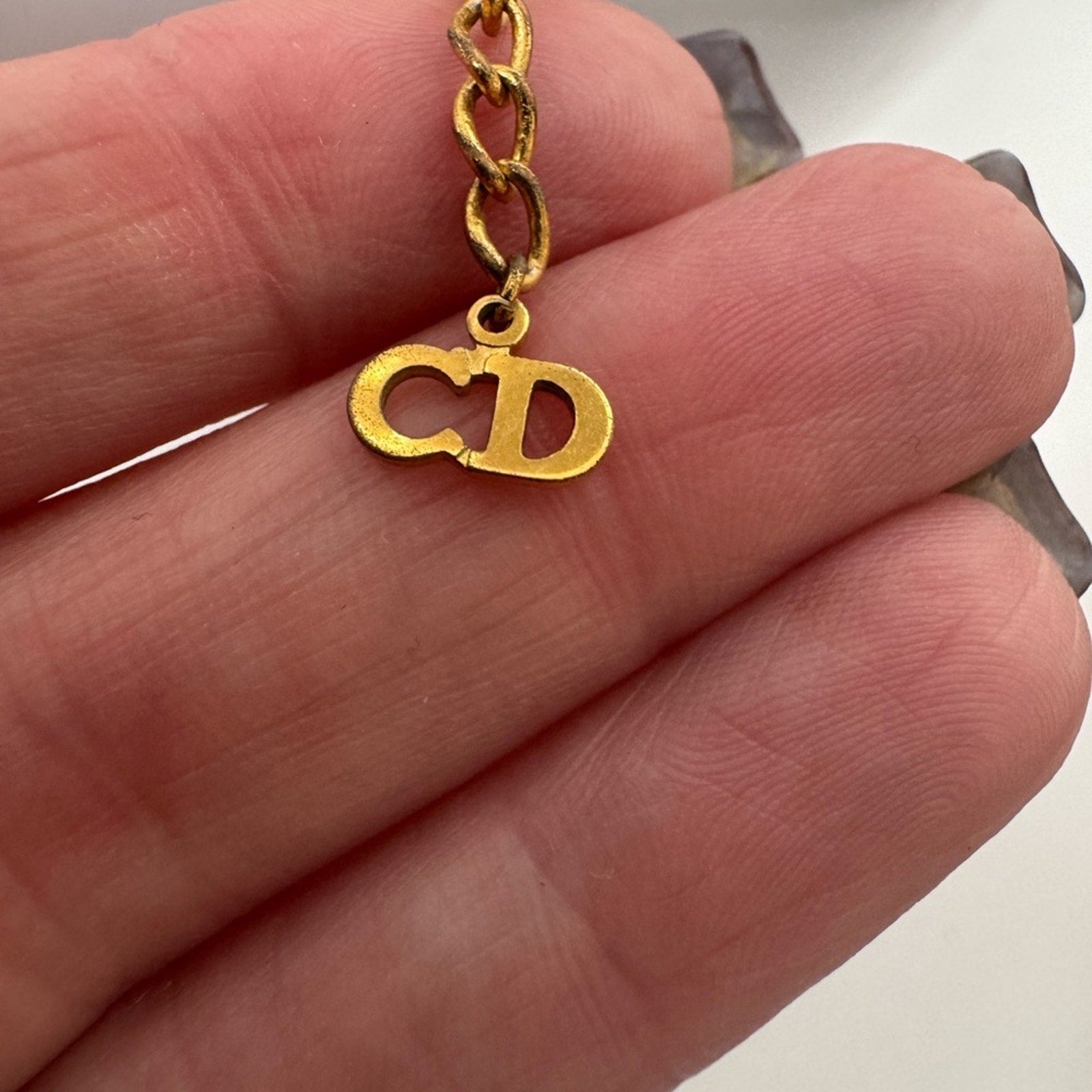 Christian Dior pendant necklace adorned with rhinestones CD clasp