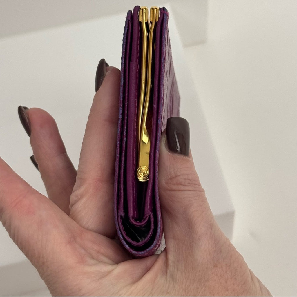 Yves Saint Laurent Purple Small Women's Wallet with decorative kiss lock snap