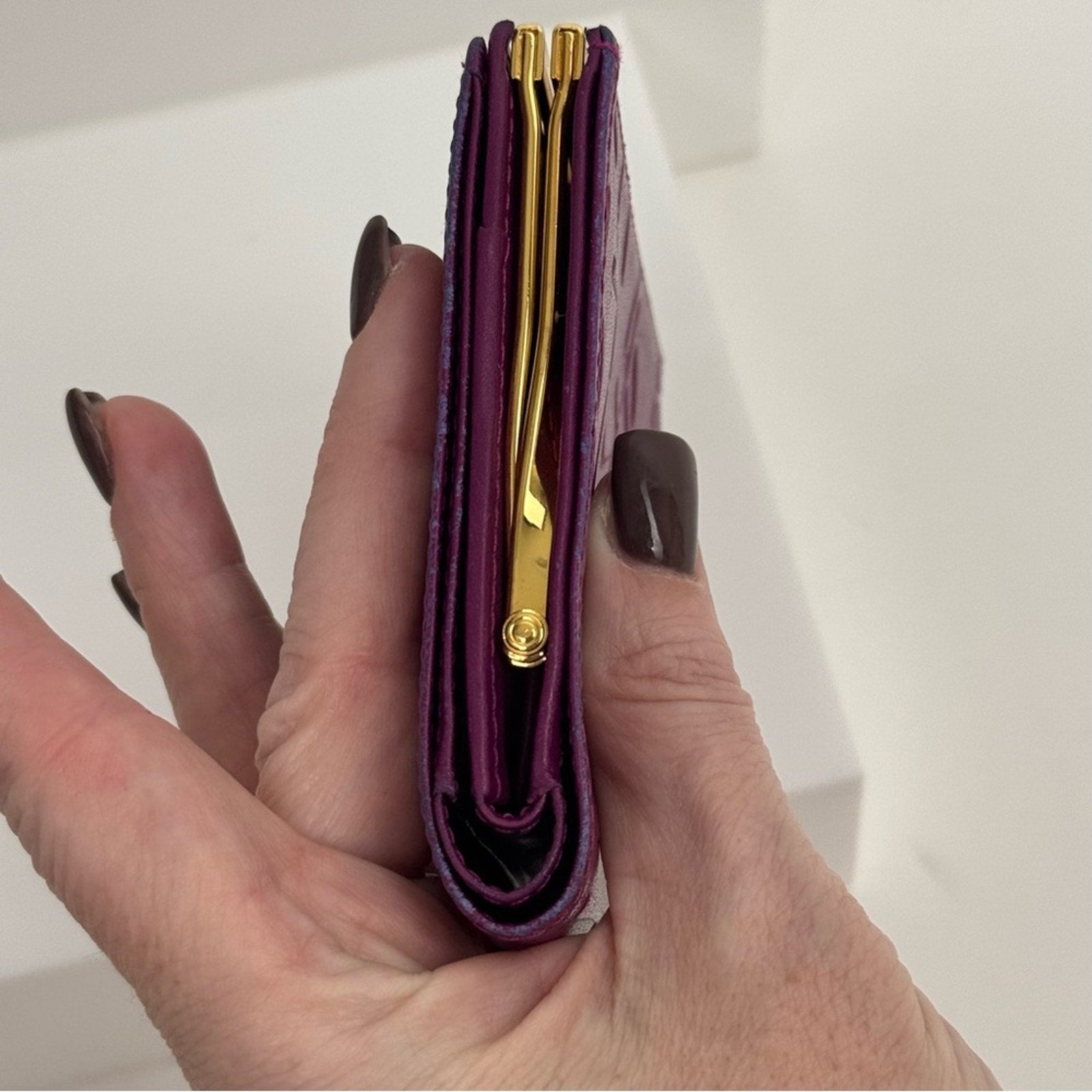 Yves Saint Laurent Purple Small Women's Wallet with decorative kiss lock snap