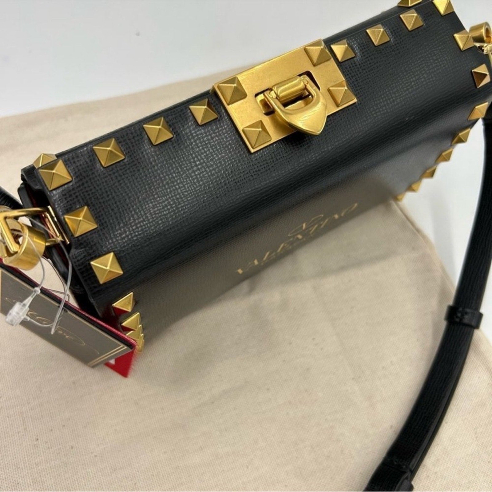 Women's Valentino Garavani gold Rockstud, leather shoulder bag made in Italy