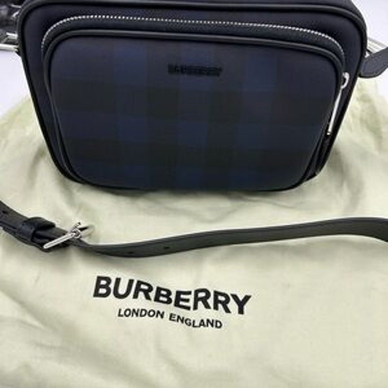 Men's Burberry, check messenger bag in navy blue. Adjustable shoulder strap.