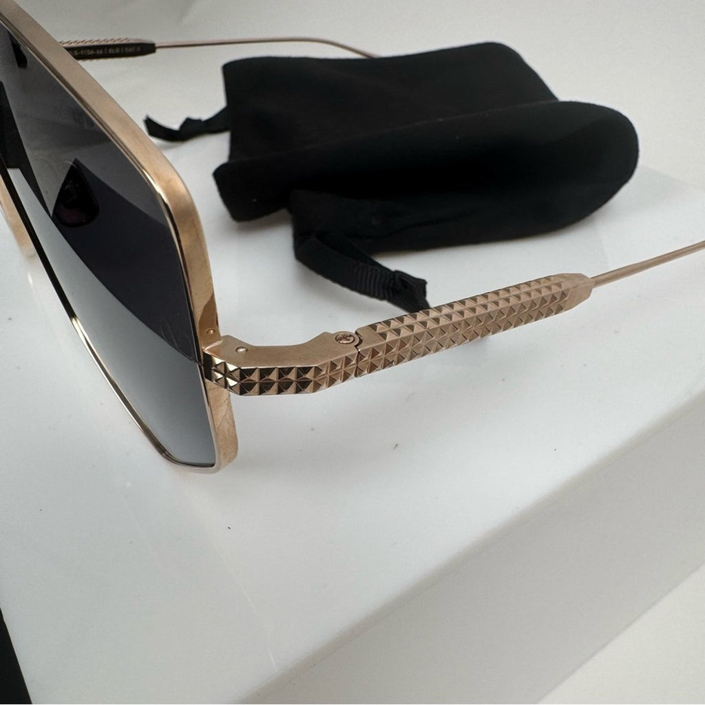 VALENTINO GARAVANI
V-Hexagon Titanium Sunglasses
Branded/crossbody bag included