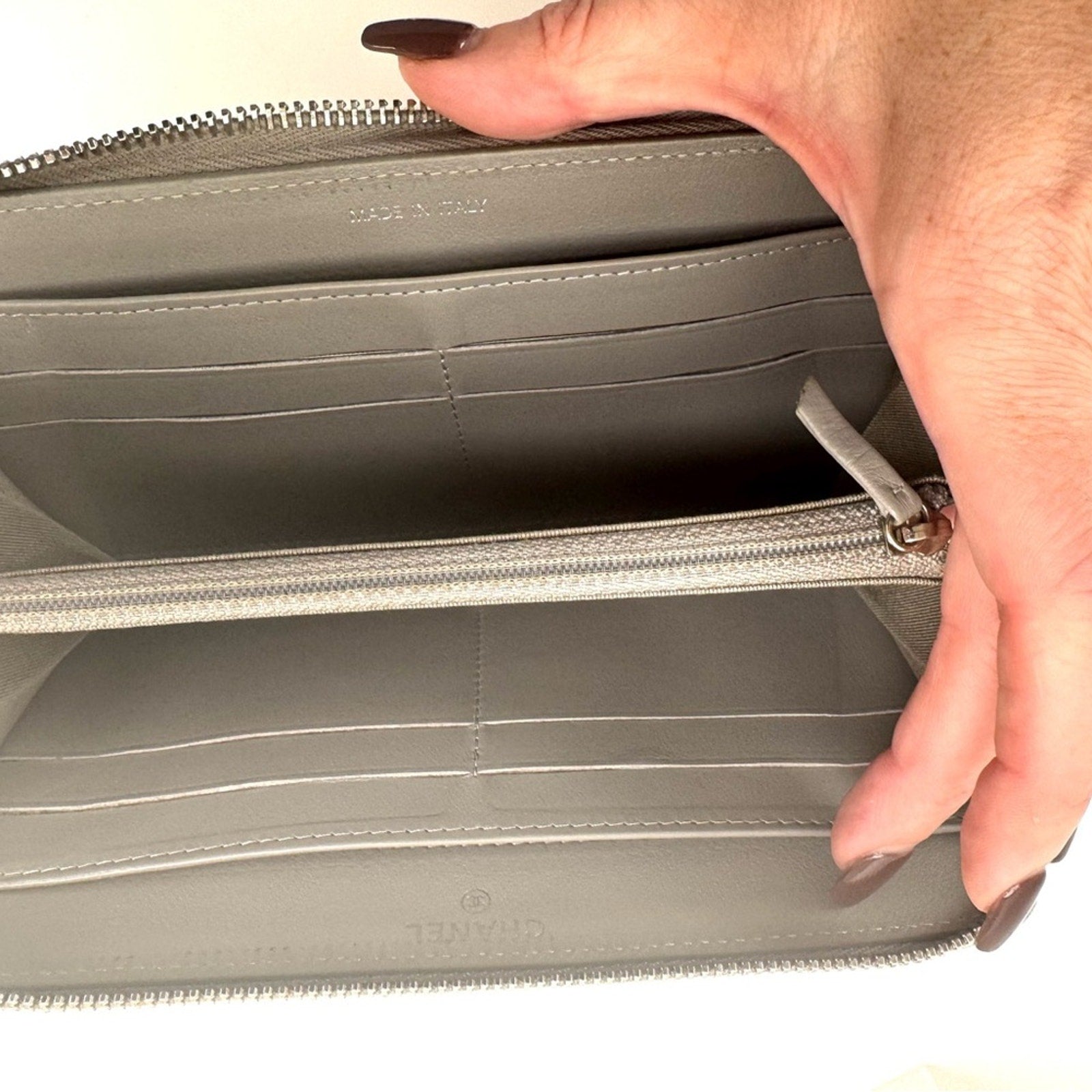 Women’s Chanel zip around long wallet, gray quilted pattern ombre holo present