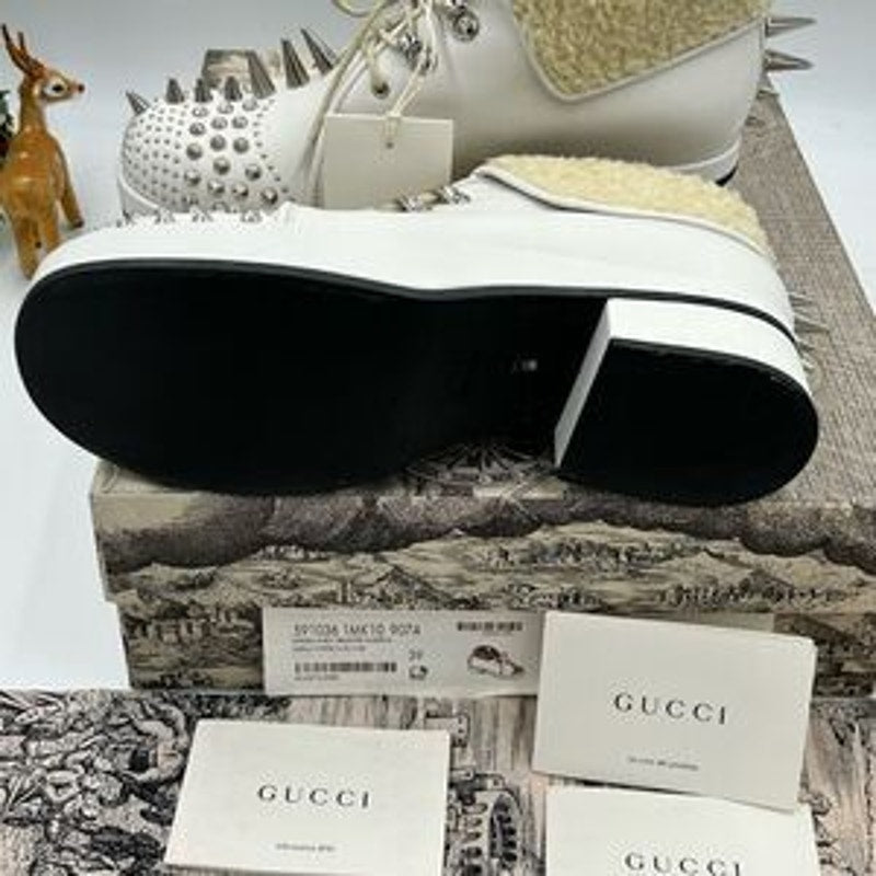 Women’s Gucci spiked shearling lined ankle boots size 39 made in Italy