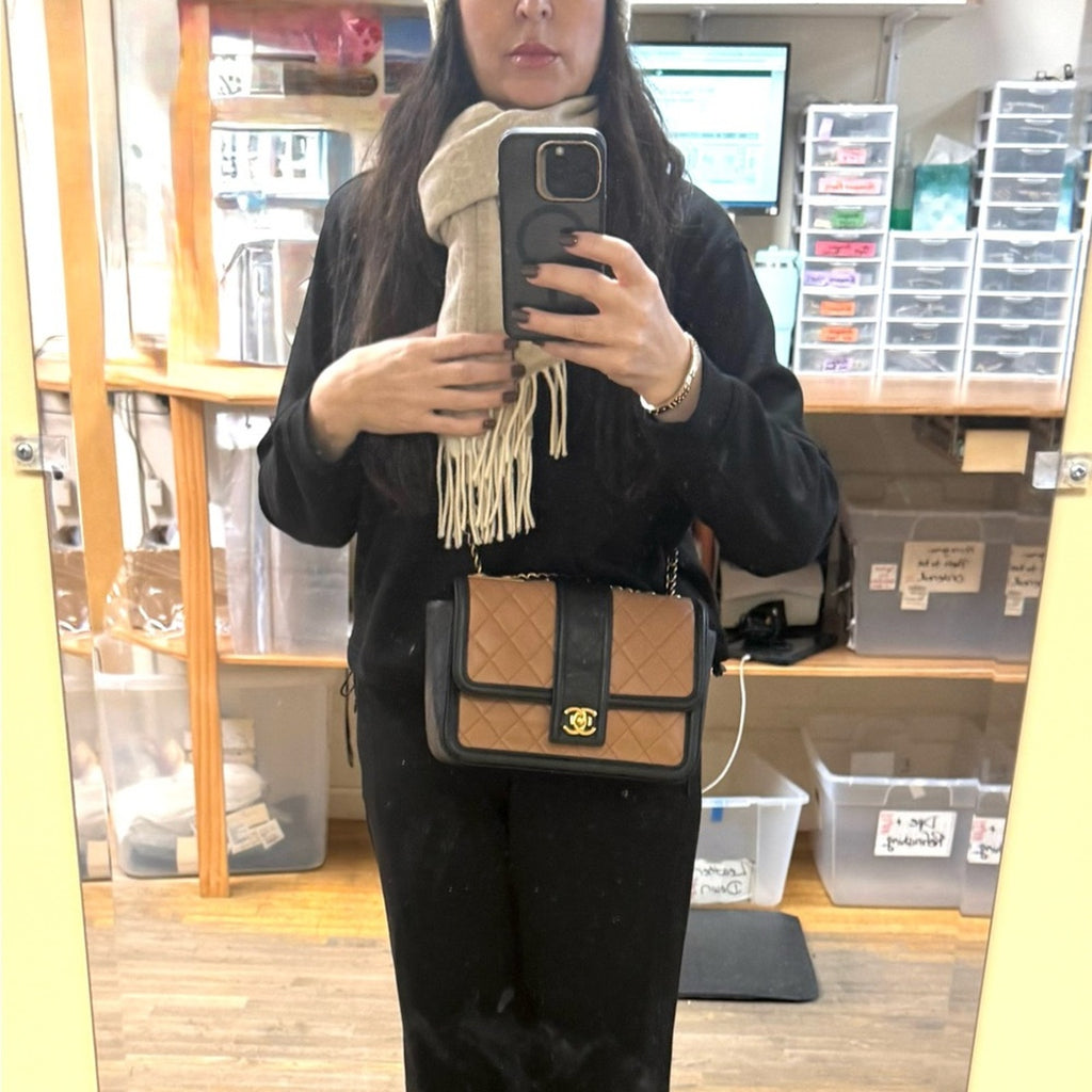 Chanel Black and Tan flap bag with gold hardware/adjustable strap/back pocket