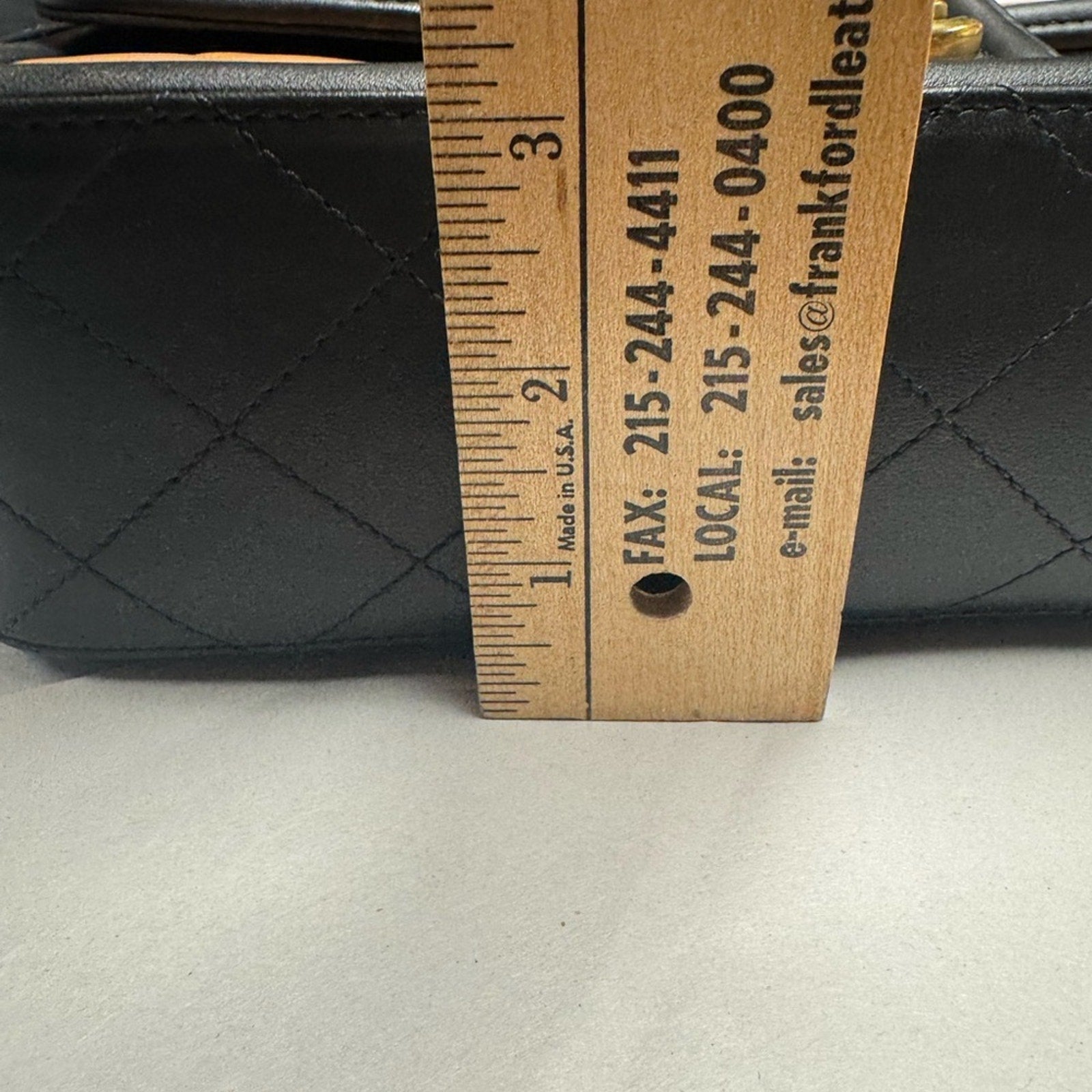 Chanel Black and Tan flap bag with gold hardware/adjustable strap/back pocket