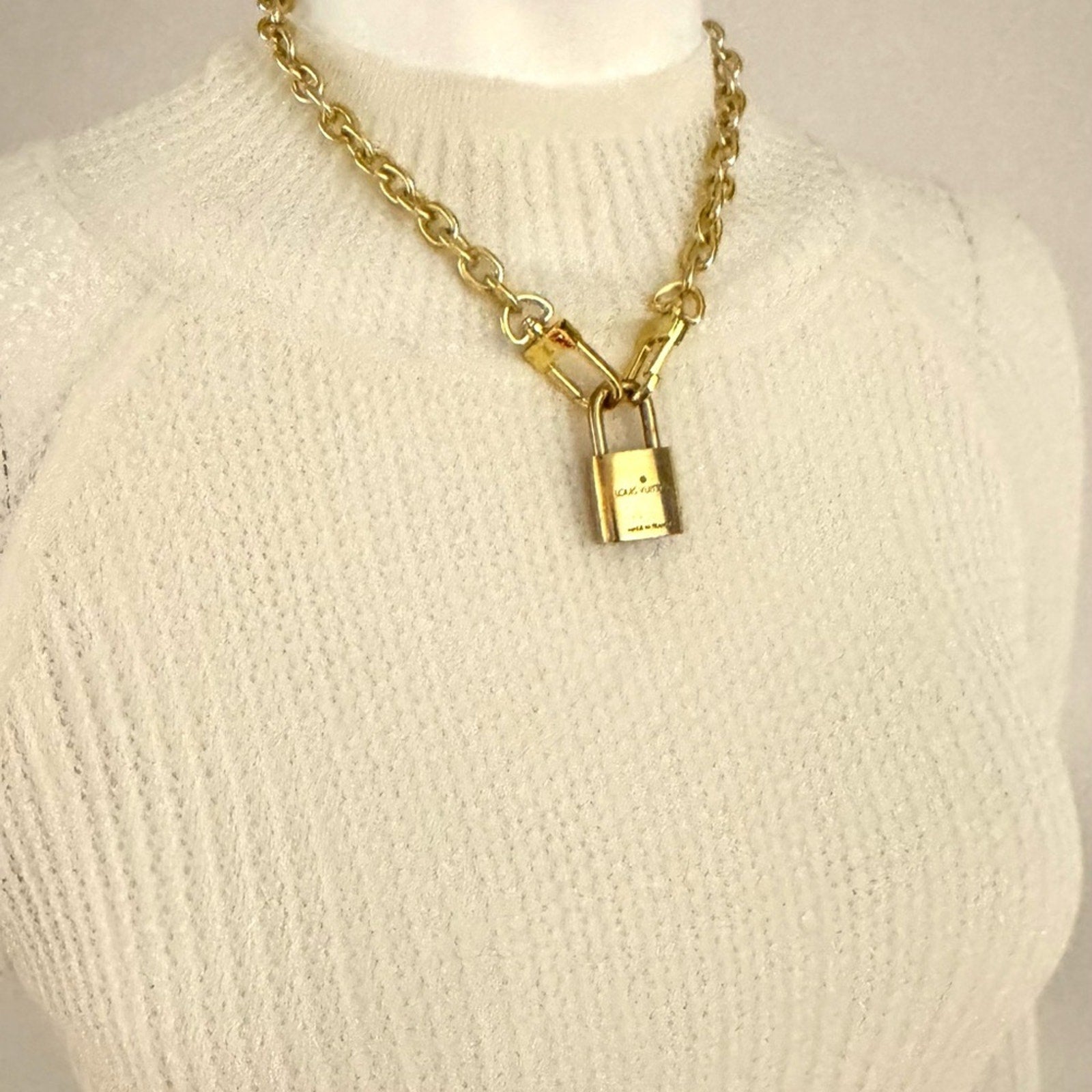 Louis Vuitton Gold Padlock #319 with LV branded chain that can be purse chain