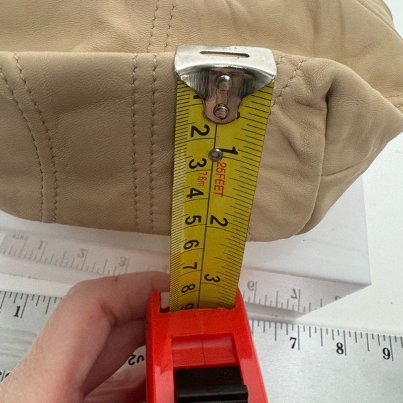 Dolce and Gabbana miniature leather bag with kiss lock, plaque and gold hardware