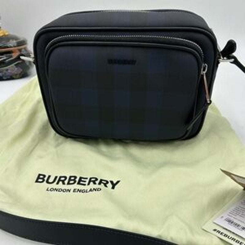 Men's Burberry, check messenger bag in navy blue. Adjustable shoulder strap.