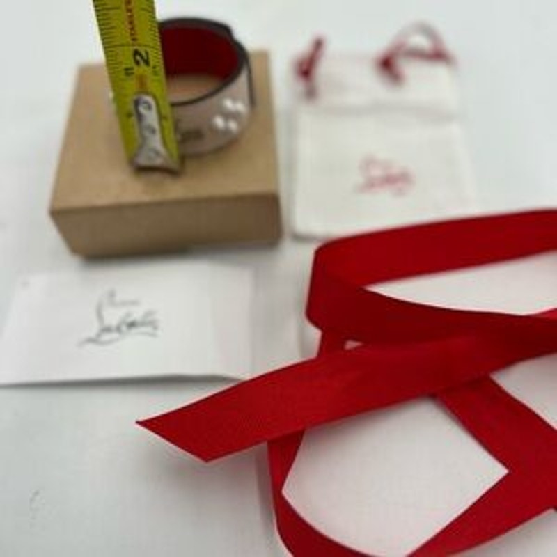 Christian Louboutin Paloma spike embellished leather bracelet. NWT.