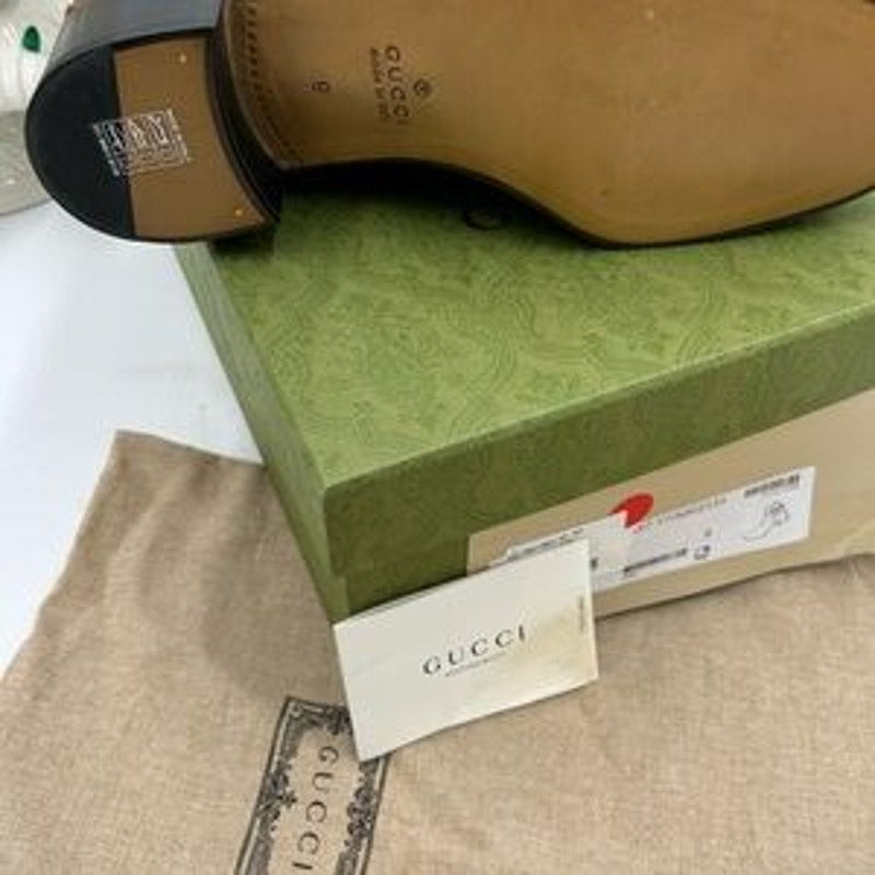 Men’s Gucci, leather ankle boots with buckle size 9 made in Italy