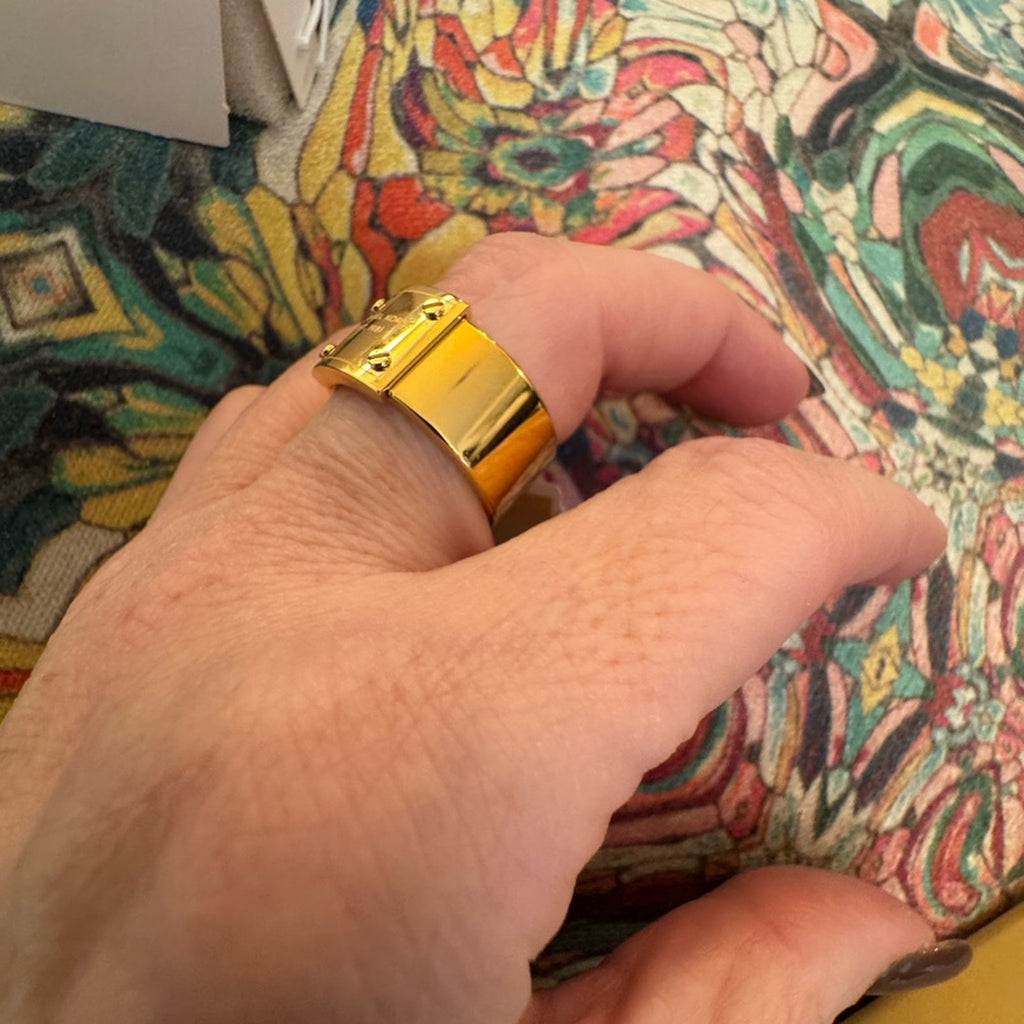 Michael Kors Gold Plated ring NIB  logo plaque riveted onto smaller band size 8
