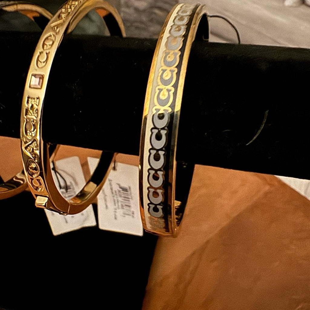 6 Coach NWT’s(each $98)& a bonus Chanel style cuff also NWT’s bundle price $399