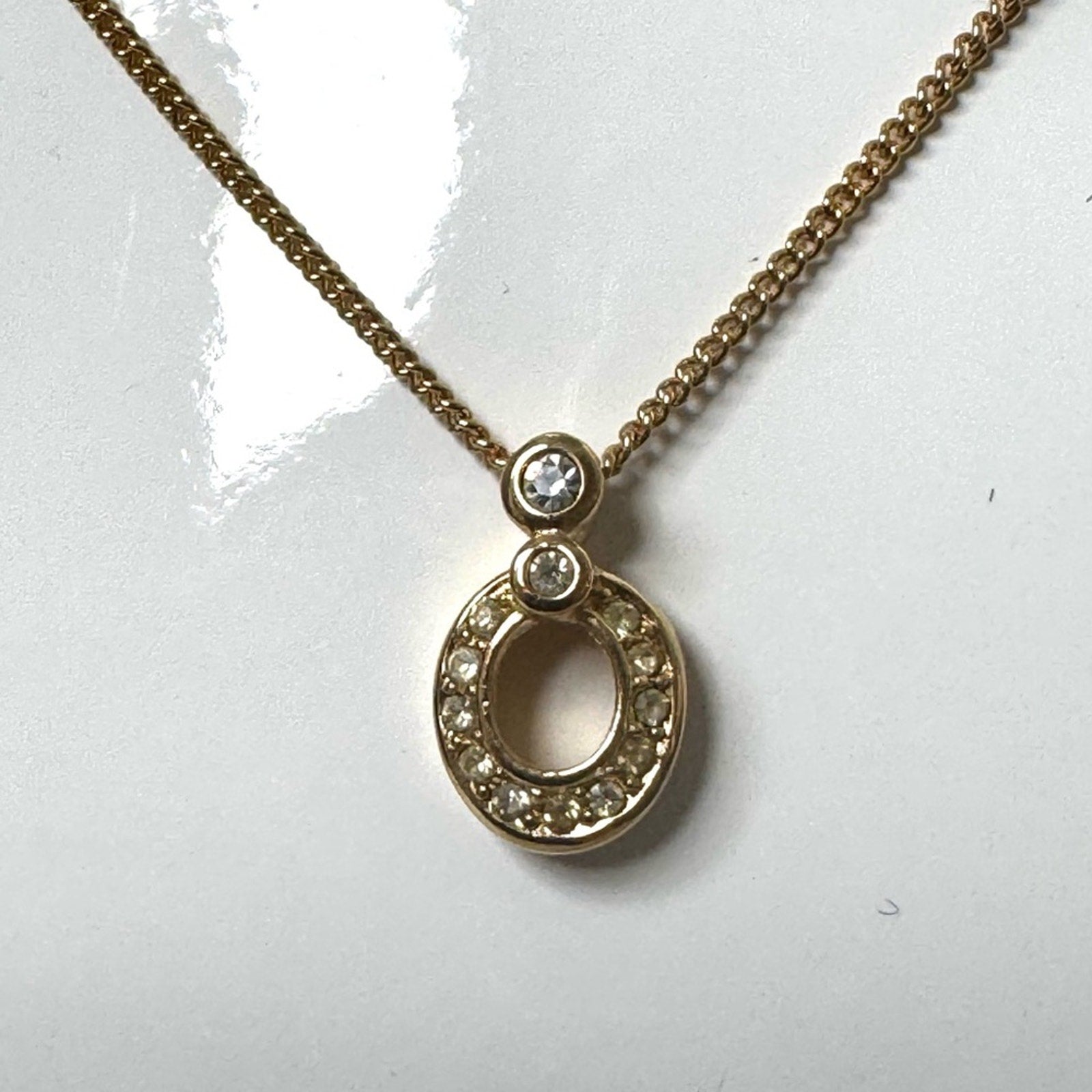 Christian Dior pendant necklace adorned with rhinestones CD clasp