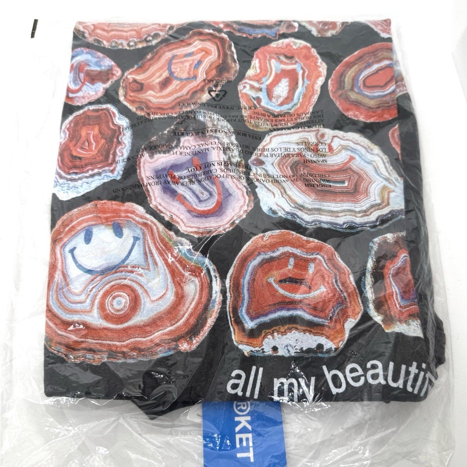 Market smiley, radiating joy, T-shirt, size large new in the bag