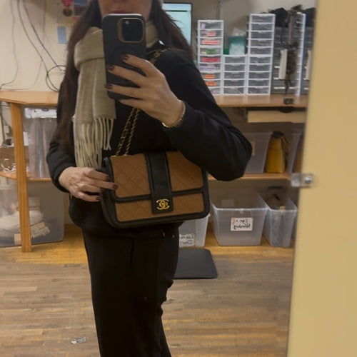 Chanel Black and Tan flap bag with gold hardware/adjustable strap/back pocket