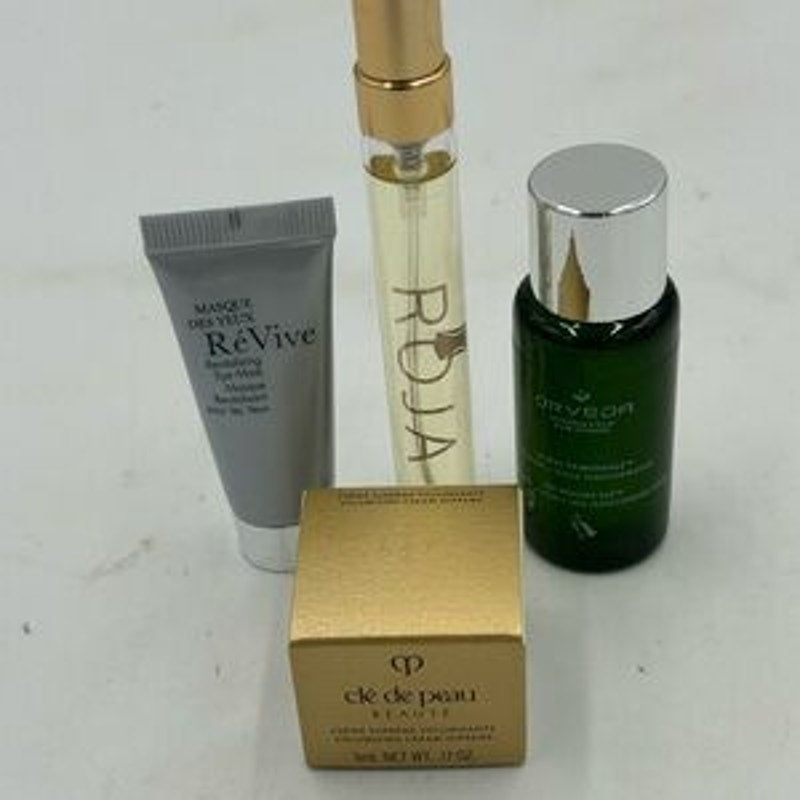 Women's gift bag,Cleau de Peau,Orvida serum , Roja perfume,Revive eye mask