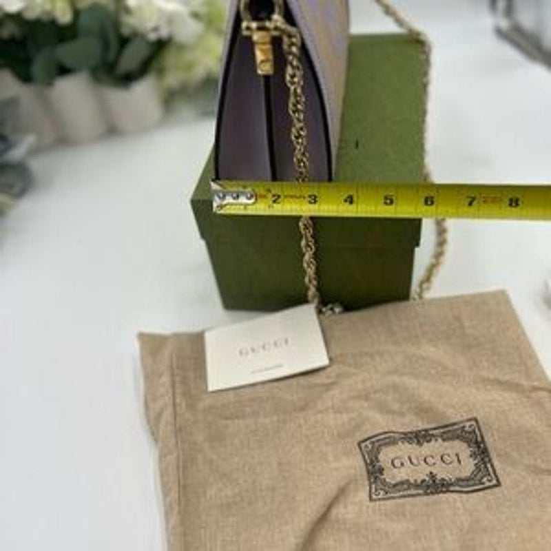 Gucci women's Ophedia jumbo GG canvas, shoulder bag with gold tone chain strap