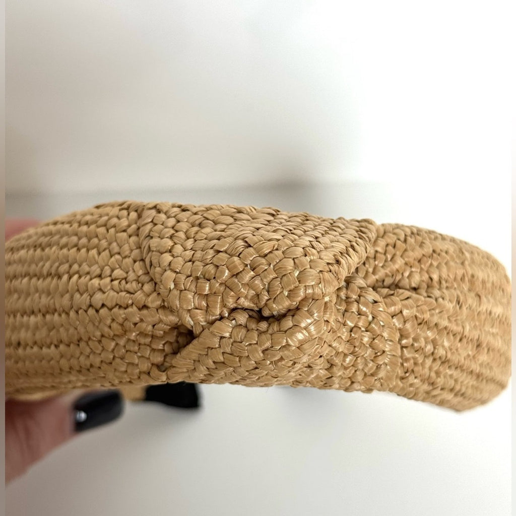 Women’s rare Eugenia Kim Rafia, knot headband
Purchased at Henry Bendel/Like New