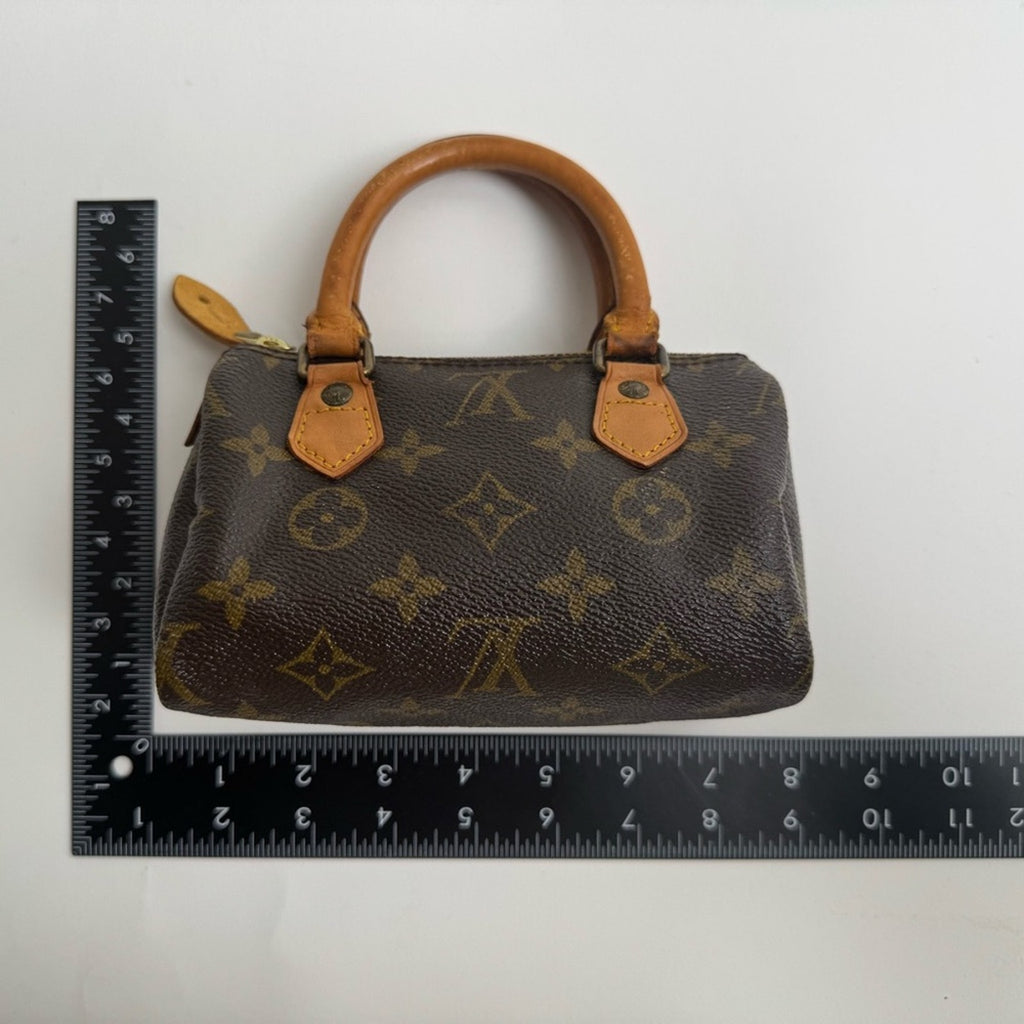 Louis Vuitton Monogram Mini Speedy HL
Replacement tab, branded rivet, Very Clean