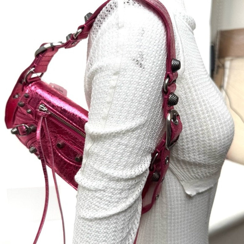 Balenciaga Metallic Agneau Arena Le Cagole Sling Bag XS in Pink. NWT’s & Dusty