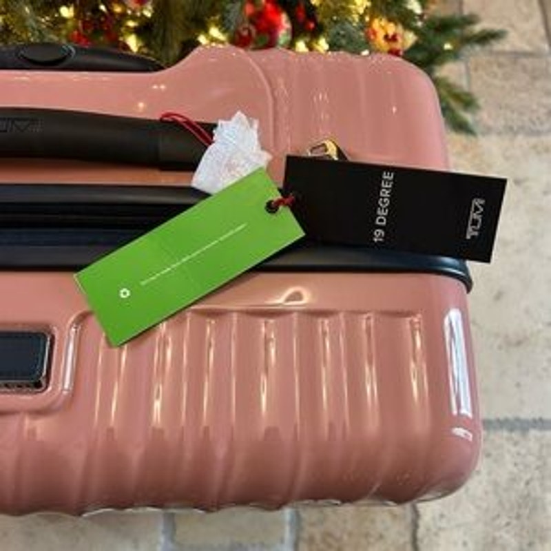 Tumi 19° extended trip expandable four-wheel packing suitcase NWT