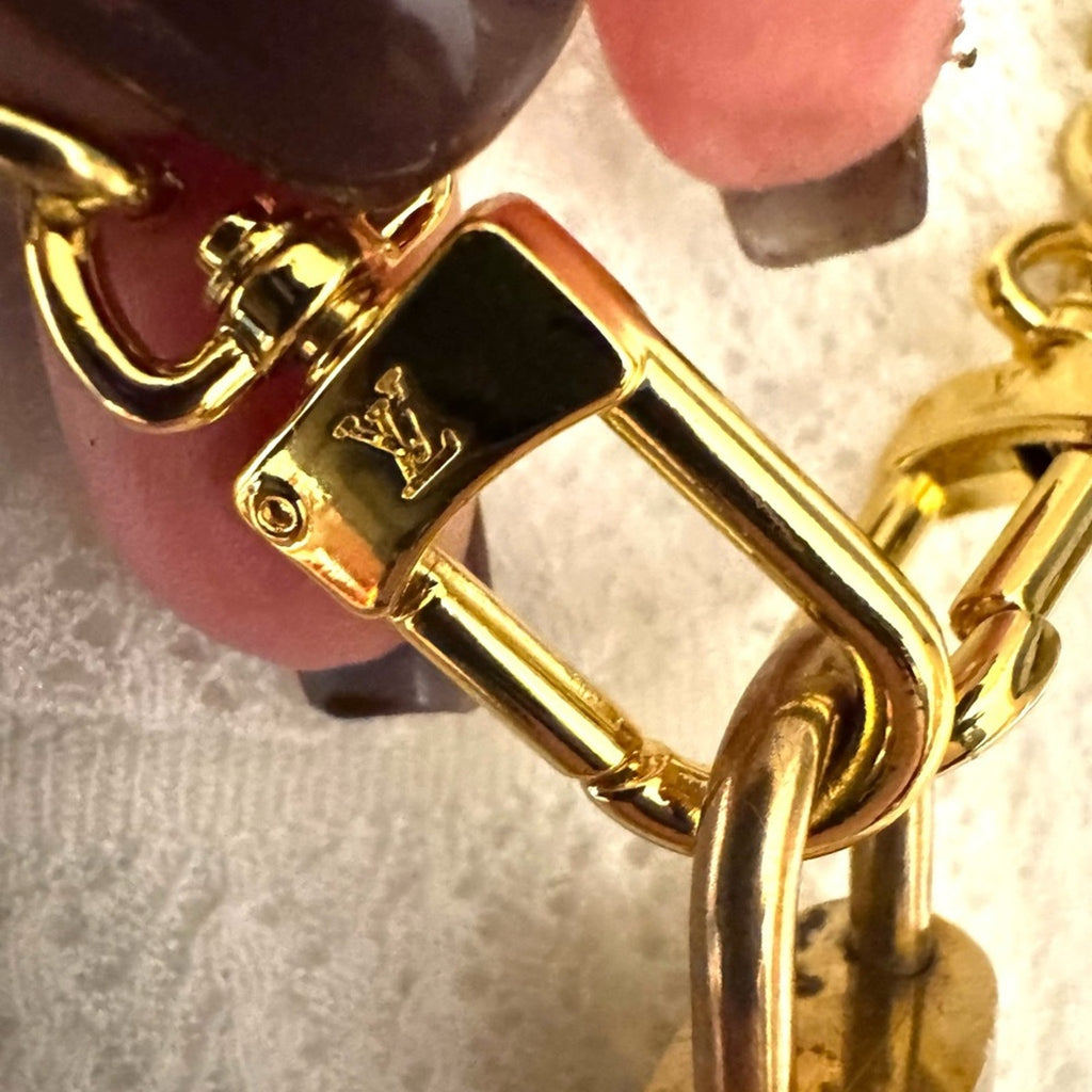 Louis Vuitton Gold Padlock #319 with LV branded chain that can be purse chain