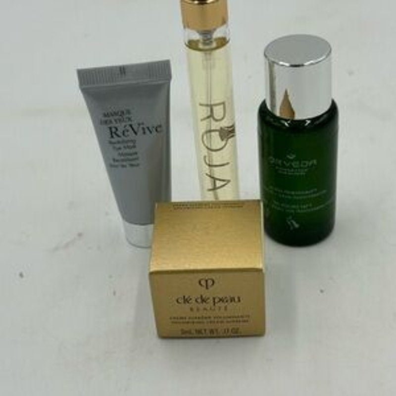 Women's gift bag,Cleau de Peau,Orvida serum , Roja perfume,Revive eye mask