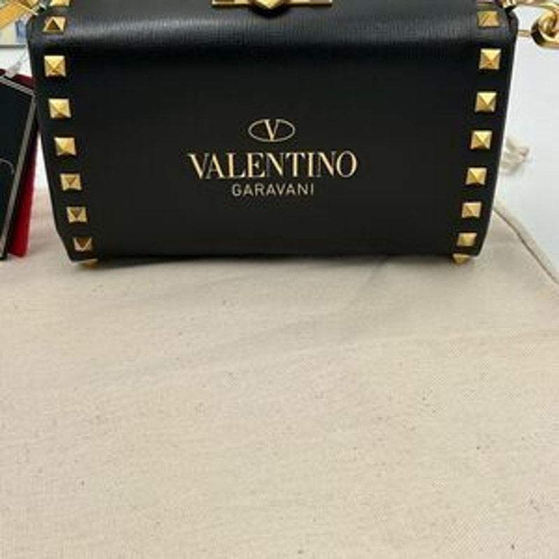 Women’s Valentino Garavani rock, stud, leather shoulder bag made in Italy