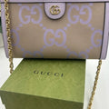 Gucci women's Ophedia jumbo GG canvas, shoulder bag with gold tone chain strap