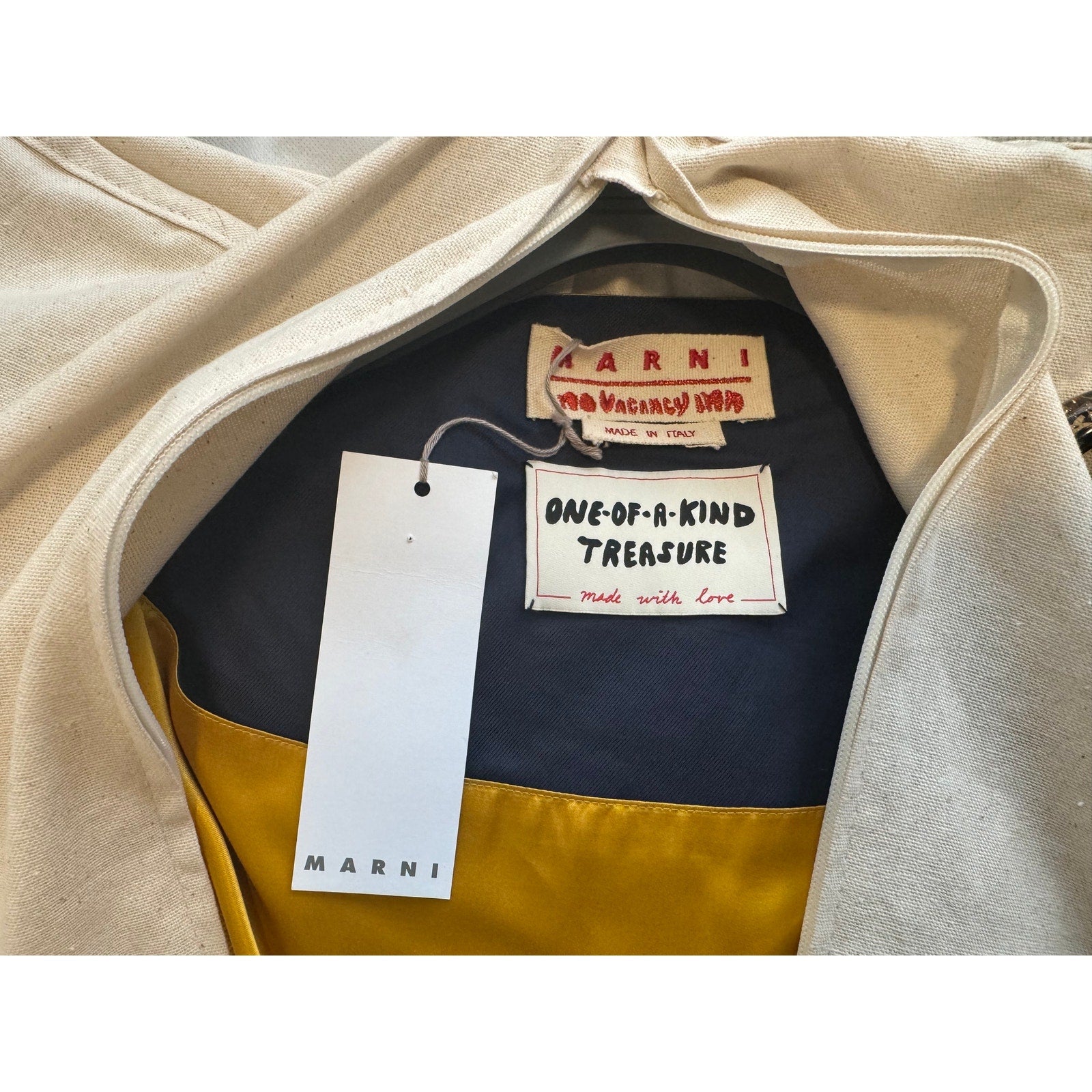 MARNI One Of A Kind Treasure, Cape is the No Vacancy Inn/Marni Collab. Feature